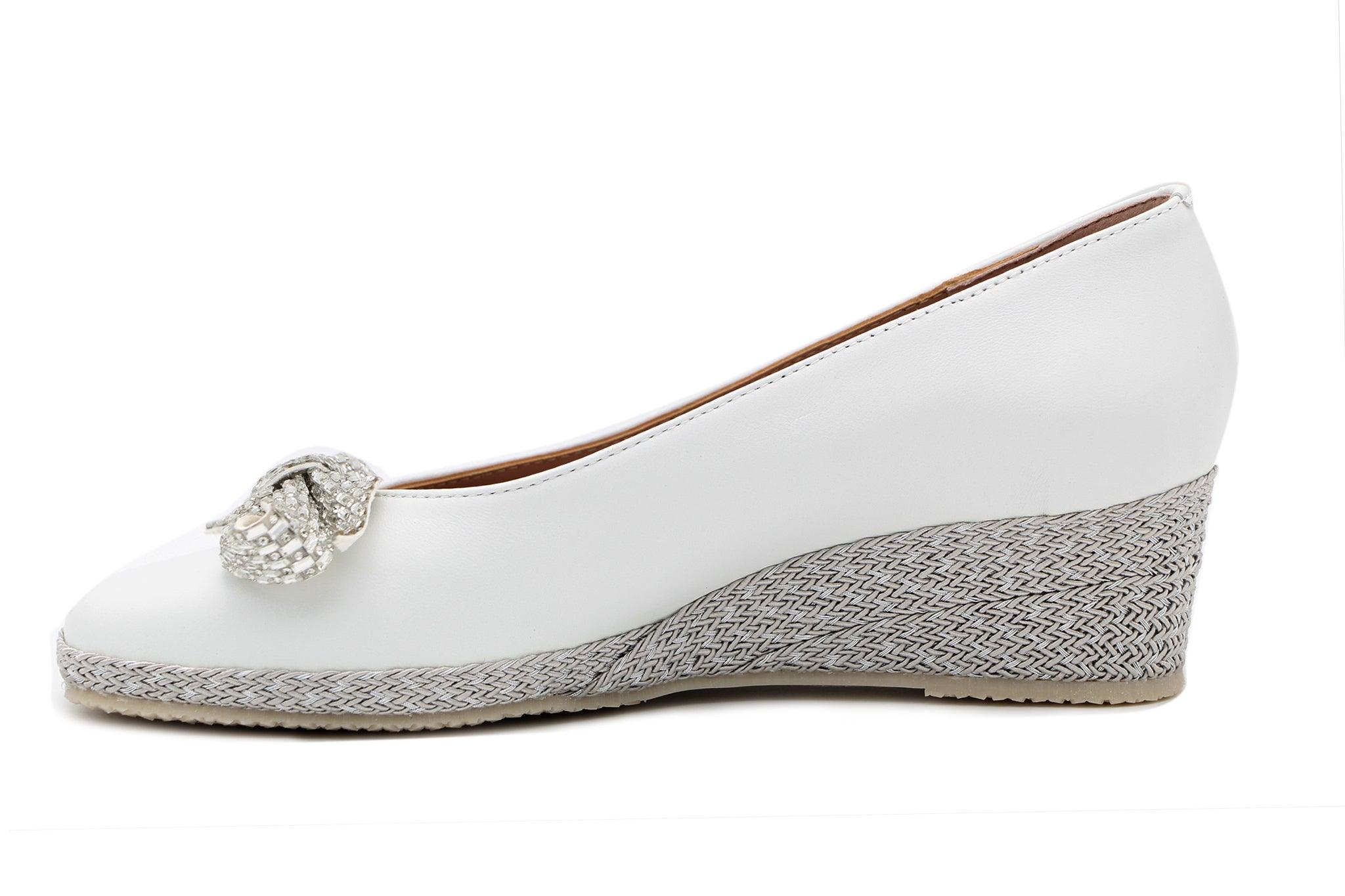 Bruno's  White Leather wedge shoe with bow